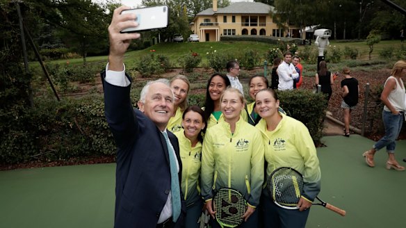 Prime Minister Malcolm Turnbull with the Australian Federation Cup tennis team on Friday. 