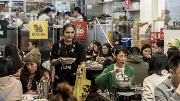 Inside the bright, colourful and crowded Nana Thai.