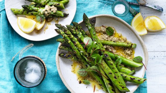 Barbecued asparagus with nutty tarator.