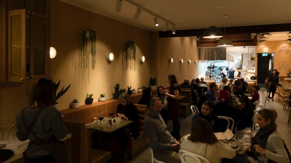 Lillah's dining area runs from the bar to a bright open kitchen.