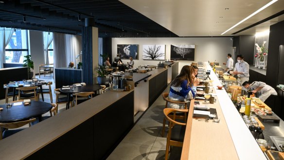 Diners sit at the counter for the omakase option.