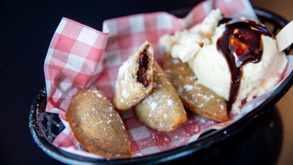 Deep-fried chocolate empanadas. 