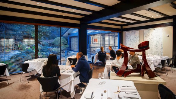 Tetsuya's minimalist dining room looks onto a Japanese garden.