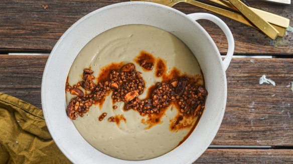 Celeriac and potato soup with crunchy buckwheat, almond and paprika topping.