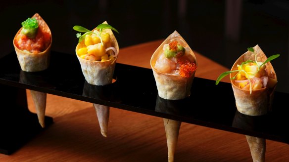 Cute sashimi cones are just the thing with a 'Japerol' spritz.