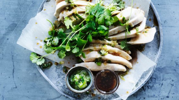 Steamed chicken with green spring onion oil.