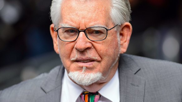 Rolf Harris is facing a London court on four charges of groping teenage girls.