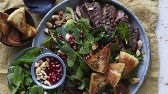 Grilled lamb salad with date paste, pomegranate and crunchy pita croutons.
