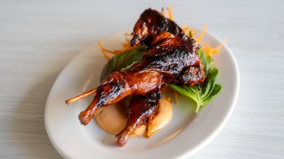 Skewered quail with ginger and sake.