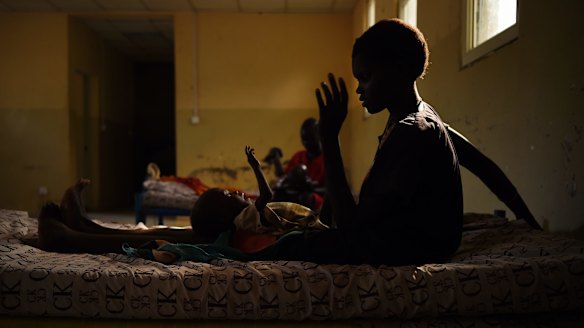 A 20-year-old South Sudanese woman with her baby at a hospital for displaced people in Bentiu, South Sudan.