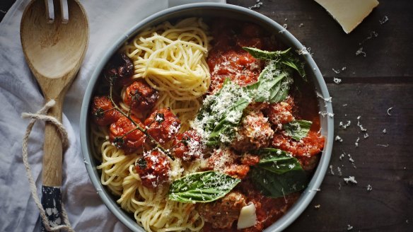 Spaghetti and meatballs served with slow-roasted cherry tomatoes and fontina cheese.