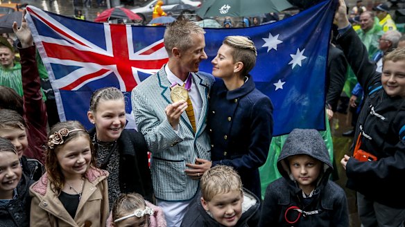 Jared Tallent with his wife Claire at the gold medal presentation ceremony for the 50km Walk for the 2012 London Olympic.