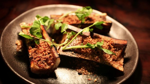 Bones loom large: Roasted bone marrow with meat dust.