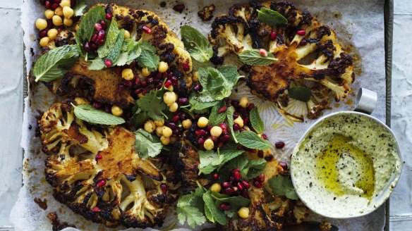Thick cauliflower steaks slathered with a spicy harissa paste and roasted until caramelised.