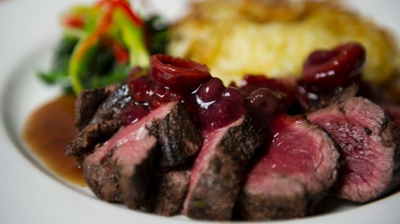 Kangaroo fillet with native fruits.