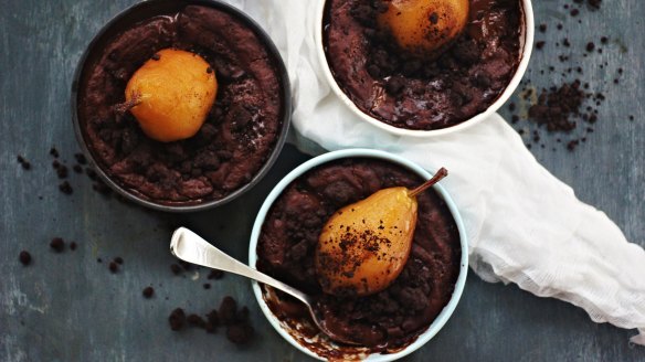 Pop a poached pear on top of each pud.