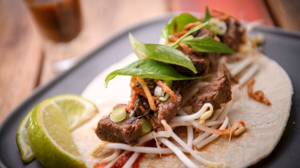 Flavour bomb: the pho taco comes with a shot glass of beef broth.