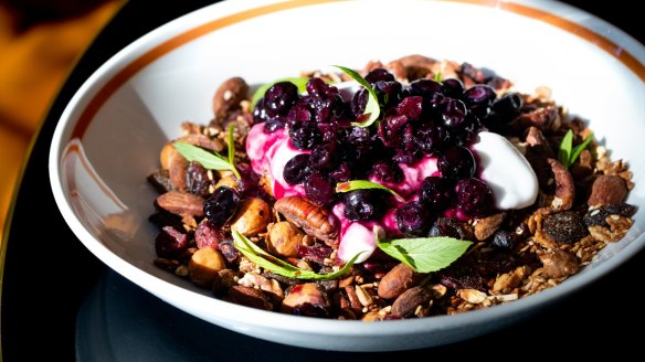 Vegan granola with coconut yoghurt, blueberry and hibiscus compote. 