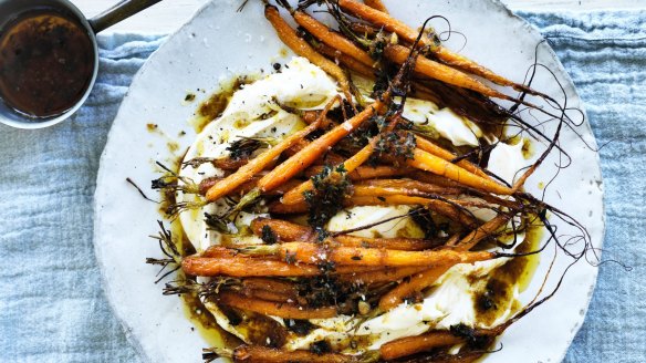 Brown butter and citrus roasted carrots on a bed of labna.