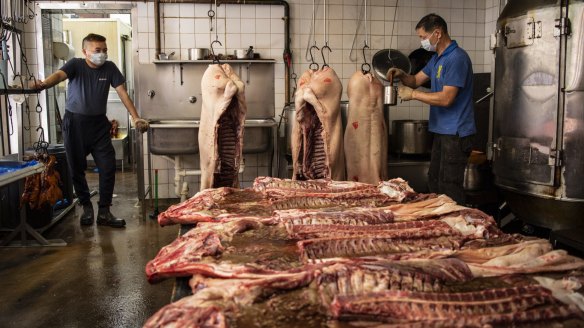 Butchers at Tan Hong Phat BBQ prepare for Tet in Cabramatta.