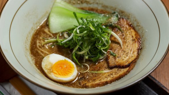 Black ramen with pork, bok choy and egg.