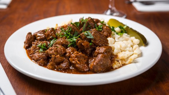 Go-to dish: Hungarian goulash with nokedli and dill pickle.