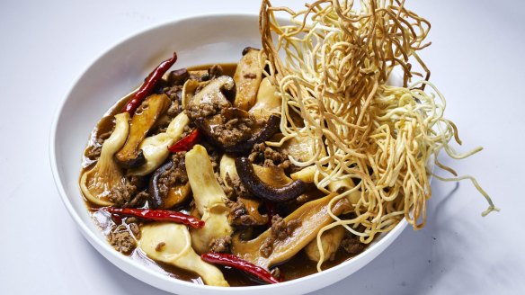 Sichuan braised mushrooms with crispy lamb and egg noodles. 