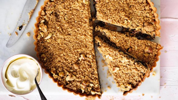 Festive mulled wine tart with crumble topping.