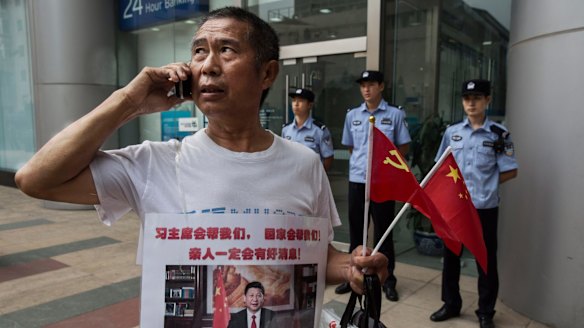 Zhang Yongli, a Chinese relative of a missing passenger on Malaysia Airlines flight MH370, waits for news in August 2015. 