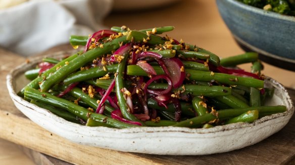 Green bean salad with pickled onions and garlic and cumin dressing.