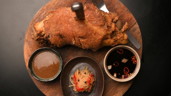 Pata (deep-fried pork knuckle with condiments).