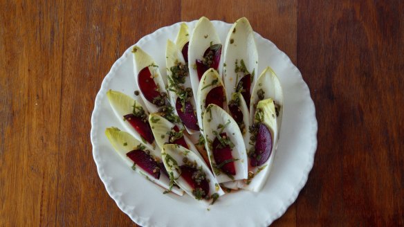 Raw endive in grilled orange vinegar at Porcine Bistro.