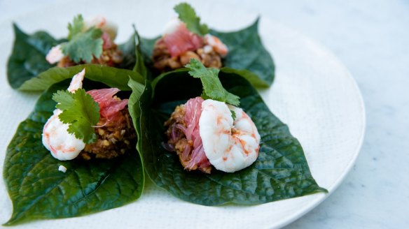 Poached prawn on betel leaf with caramelised peanut dressing.