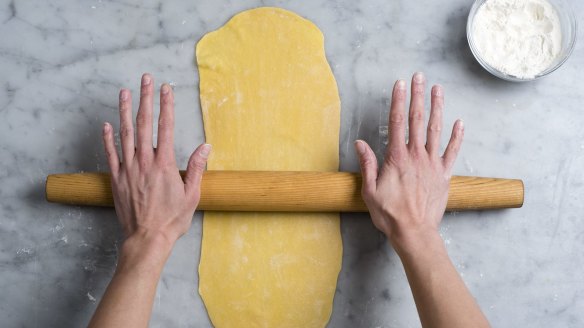 A roller is used to make basic pasta by hand.