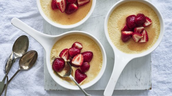 Vanilla pots de creme with macerated strawberries.