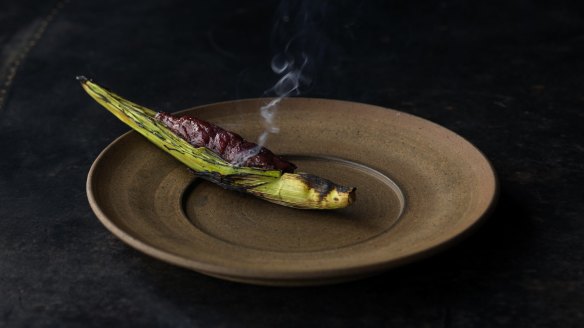 Barbecued baby corn with macadamia miso and cured kangaroo at Vue de Monde, Melbourne.
