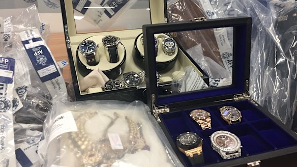 Police have seized hundreds of items, including watches, cars, motorbikes, airplanes, properties and cash.