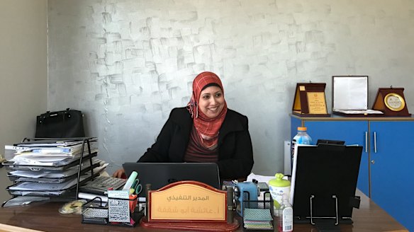 Aesha Abu Shaqfa works at the Future Development Commission, one of many local NGOs seeking to further women's rights in a male-dominated society.