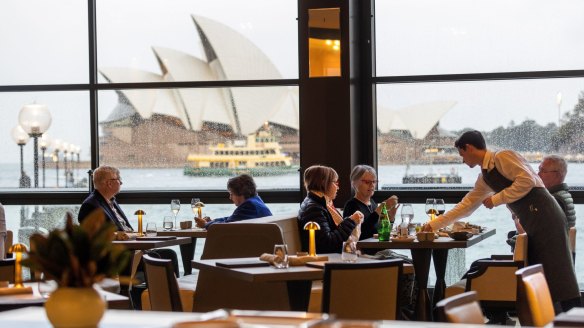 The dining room backdropped by the Sydney Opera House at Dining by James Viles.