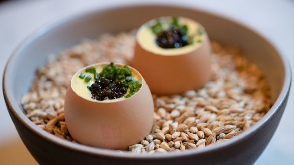 Snacks might include a soft-boiled egg with cream corn and caviar.