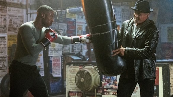 Michael B Jordan (left) is the champion boxer Adonis Creed and Sylvester Stallone is Rocky Balboa in Creed II.