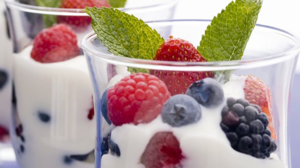 Flavour natural yoghurt with berries or other fruit. 