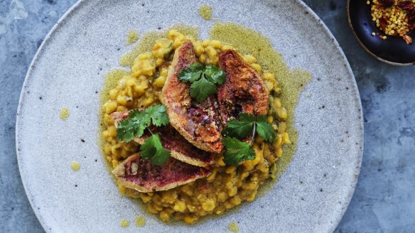 Spices fried in hot oil add an extra layer of flavour to the red mullet and yellow dal.