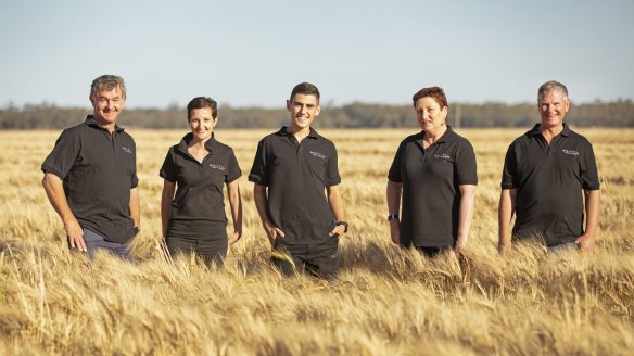 The Whitton Malt House team in the field that supplies barley for the malt.