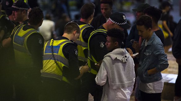 Police out in force on Sunday night, after Saturday's riot.