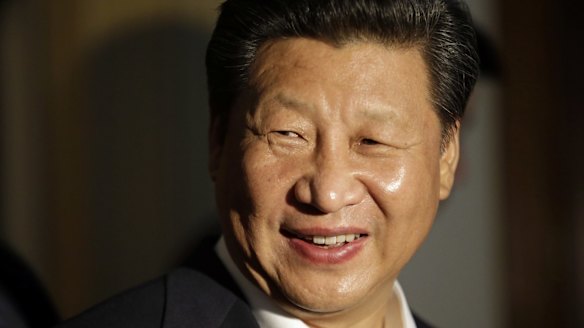Chinese President Xi Jinping smiles as he concludes a visit to Lincoln High School in Tacoma, Washington, during his US visit.