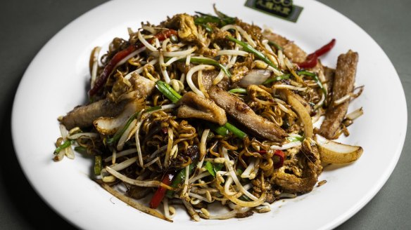 Stir-fried pork chop and instant noodles in XO sauce.