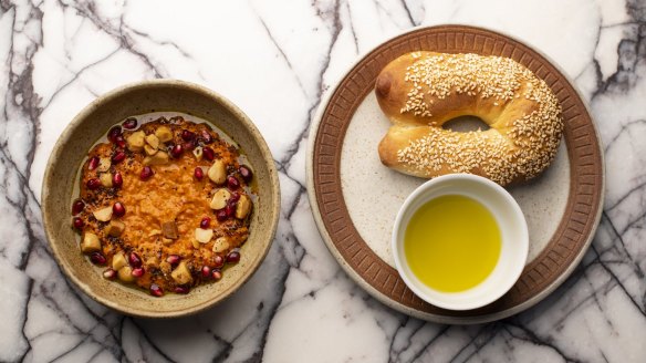 Jerusalem bagel pictured with macadamia muhamurra (left).