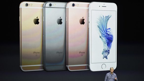 Apple chief executive Tim Cook unveils the iPhone 6s, in four colours.