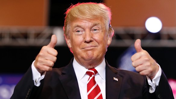 President Donald Trump reacts before speaking at a rally at the Phoenix Convention Centre.